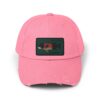 A pink baseball cap with a rectangular patch showing a small image.