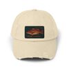 Beige baseball cap with a colorful fish patch.