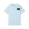Light blue t-shirt with a small black pocket on the chest.