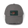 A gray baseball cap with a small rectangular patch featuring a colorful design.