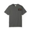 A dark gray T-shirt with a small rectangular graphic on the chest pocket area.