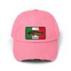A pink baseball cap with a Mexican flag patch.