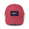 A red baseball cap with a fish patch on the front.