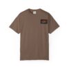 A brown T-shirt with a small rectangular logo on the chest pocket area.
