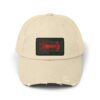Beige baseball cap with a distressed patch.