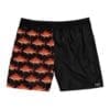 Black and orange shorts with a fish pattern on one side.