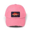 A pink baseball cap with a fish patch on the front.