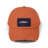 Orange baseball cap with a fish patch on the front.