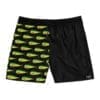 Black swim shorts with fish pattern on one side.