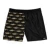 A pair of black shorts with one side featuring a shark pattern.