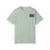 Light green T-shirt with a small rectangular patch on the chest.