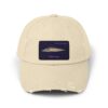 Beige baseball cap with a fish patch on the front.