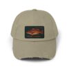 Beige cap with a colorful fish patch on the front.