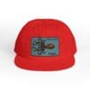 Red cap with a squid logo and text patch.