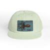 Light green cap with an octopus patch on the front.
