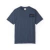 A plain navy blue t-shirt with a small rectangular patch on the chest.