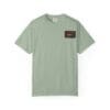 Light green t-shirt with a small brown chest pocket design.
