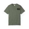 Olive green T-shirt with a small black rectangular patch on the chest pocket area.