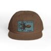 Brown cap with an octopus design patch.