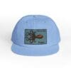 Light blue cap with an octopus patch on the front.