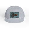 Light gray snapback hat with an octopus patch design.