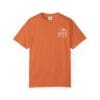 Orange T-shirt with a small white graphic on the chest.