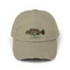 Beige baseball cap with a colorful fish embroidered on the front.