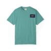 Teal short-sleeve t-shirt with a small rectangular logo patch on the chest.