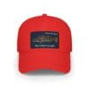 Red baseball cap with a blue patch and text design.