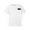 White T-shirt with a small, dark rectangular graphic on the chest pocket area.