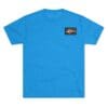 Blue t-shirt with a small rectangular logo on the chest.