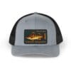 Gray and black trucker hat with a fishing lure patch.