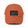 Orange baseball cap with a car patch and distressed details.