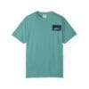 Teal t-shirt with a small dark blue pocket on the chest.