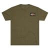 Olive green t-shirt with a small graphic patch on the chest.