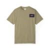 Beige T-shirt with a dark rectangular patch on the chest pocket area.