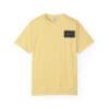 Yellow T-shirt with a black rectangular pocket detail.