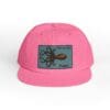 Pink baseball cap with an octopus patch.