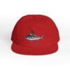 Red cap with a detailed shark embroidery on the front.