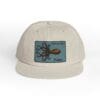 Beige cap with an octopus patch on the front.