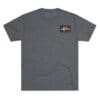 Gray T-shirt with a small square graphic on the chest.