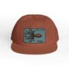 Brown cap with an octopus logo patch on the front.