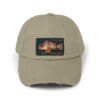 Khaki baseball cap with a graphic patch of a woman's face.