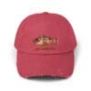 Red baseball cap with a distressed fish design on the front.