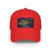 Red baseball cap with a colorful embroidered patch on the front.