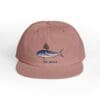 Muted pink cap with a blue whale embroidery and 'THE WHALE' text.