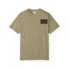Beige t-shirt with a small black rectangular patch on the chest.