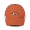 Rust-colored distressed baseball cap with a fish graphic.