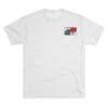 White t-shirt with a small colorful graphic on the chest.