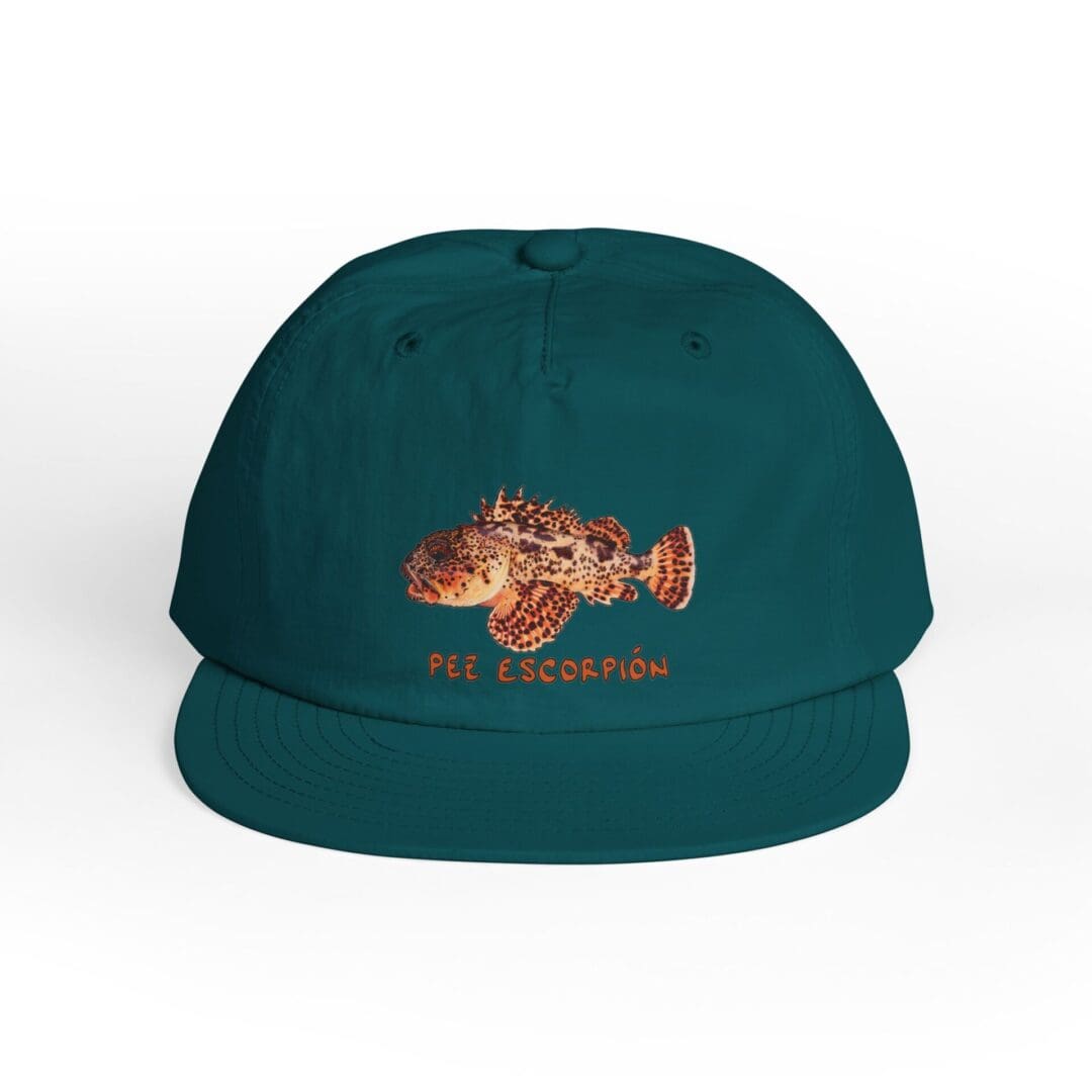 Teal snapback cap with embroidered orange and beige fish design.
